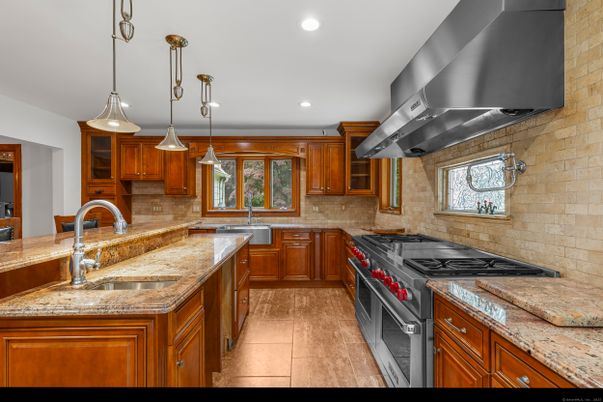 Interior, Kitchen, Pendant Lights, Recessed Lighting, Stainless Steel Appliances, Stone Walls