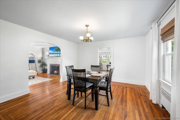 Chandelier, Dining room, Fireplace, Interior, Wood Texture Flooring