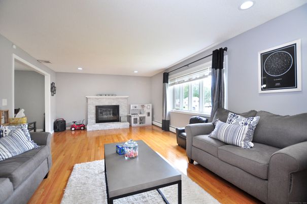 Fireplace, Interior, Living room, Recessed Lighting, Wood Texture Flooring