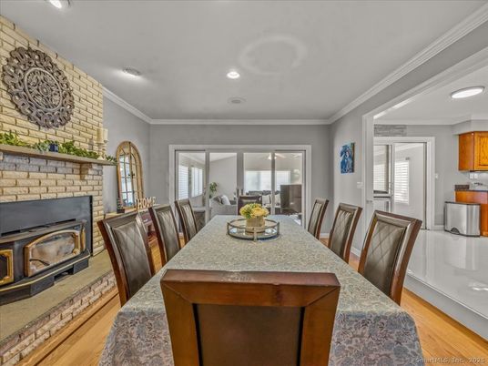Dining room, Fireplace, Interior, Recessed Lighting, Wood Texture Flooring