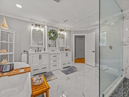 Bathroom, Dual Sink Vanities, Glass Shower, Interior, Marble, Marble Walls, Recessed Lighting