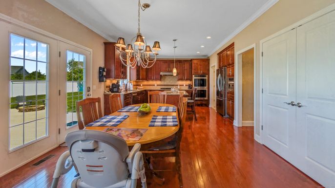 Chandelier, Dining room, Interior, Kitchen, Recessed Lighting, Stainless Steel Appliances, Wood Texture Flooring
