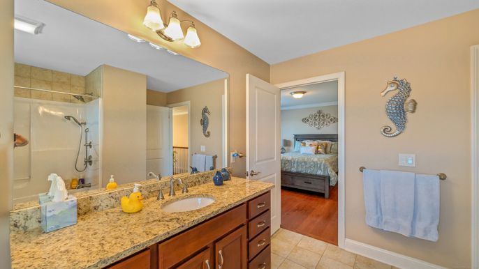 Bathroom, Bedroom, Dual Sink Vanities, Glass Shower, Interior, Wood Texture Flooring