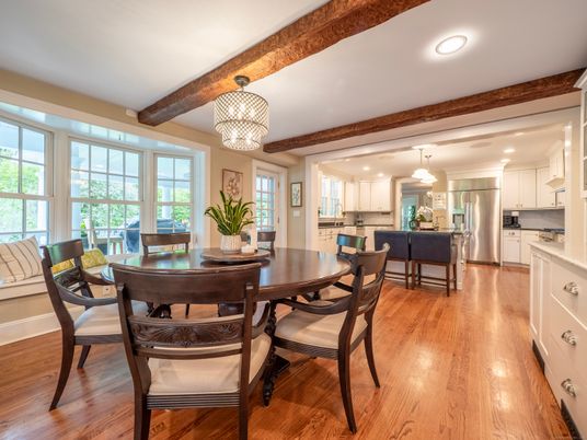 Chandelier, Dining room, Interior, Kitchen, Recessed Lighting, Stainless Steel Appliances, Wooden Beams, Wood Texture Flooring