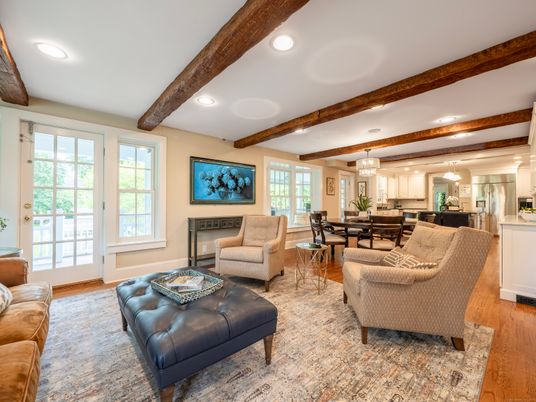 Chandelier, Dining room, Interior, Kitchen, Living room, Recessed Lighting, Stainless Steel Appliances, Wooden Beams, Wood Texture Flooring