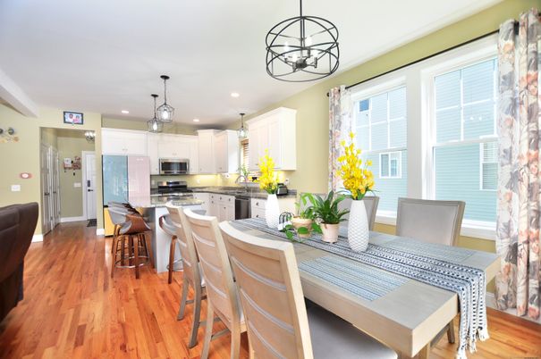 Dining room, Interior, Kitchen, Pendant Lights, Recessed Lighting, Stainless Steel Appliances, Wood Texture Flooring