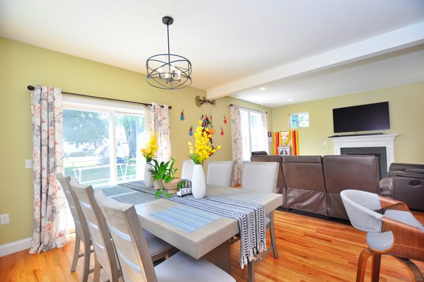 Dining room, Fireplace, Interior, Living room, Pendant Lights, Recessed Lighting, Wood Texture Flooring