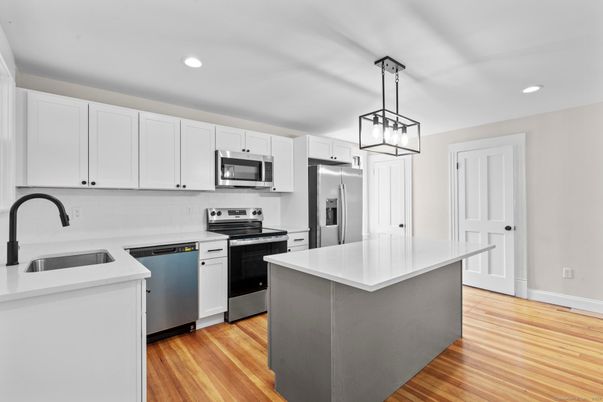 Interior, Kitchen, Pendant Lights, Recessed Lighting, Stainless Steel Appliances, Wood Texture Flooring