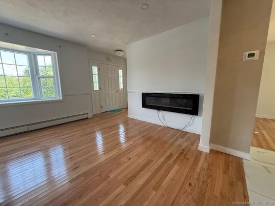 Empty room, Fireplace, Interior, Recessed Lighting, Wood Texture Flooring