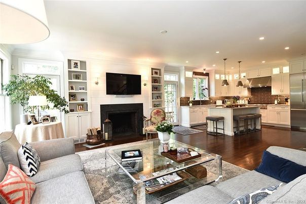 Fireplace, Interior, Kitchen, Living room, Pendant Lights, Recessed Lighting, Stainless Steel Appliances, Wood Texture Flooring