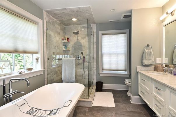 Bathroom, Dual Sink Vanities, Free Standing Baths, Glass Shower, Interior, Marble Walls, Recessed Lighting