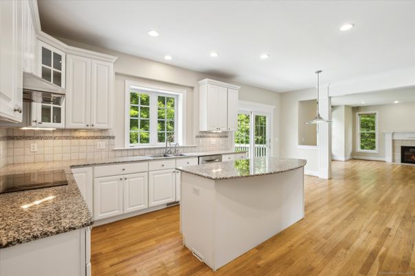 Fireplace, Interior, Kitchen, Pendant Lights, Recessed Lighting, Wood Texture Flooring