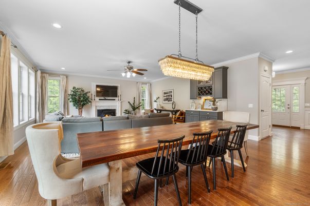 Chandelier, Dining room, Fireplace, Interior, Living room, Recessed Lighting, Wood Texture Flooring