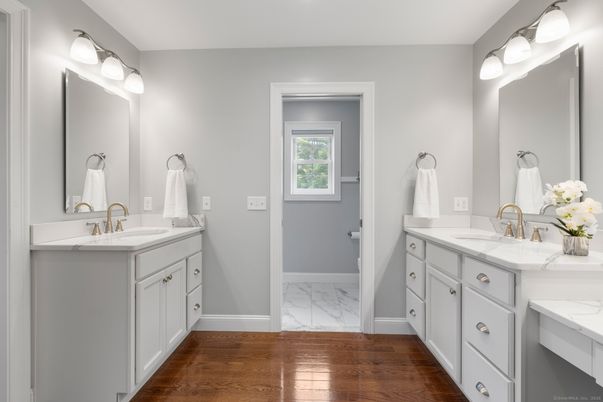 Bathroom, Dual Sink Vanities, Interior, Marble, Wood Texture Flooring
