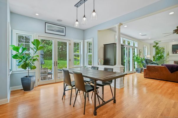 Dining room, Fireplace, Interior, Pendant Lights, Recessed Lighting, Wood Texture Flooring