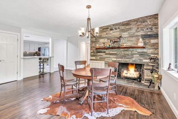 Chandelier, Dining room, Fireplace, Interior, Kitchen, Pendant Lights, Wood Texture Flooring, Wooden Walls