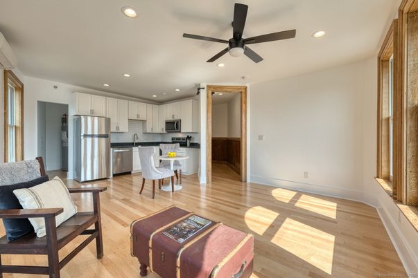 Dining room, Interior, Kitchen, Recessed Lighting, Stainless Steel Appliances, Wood Texture Flooring