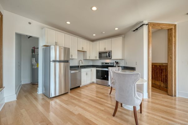 Interior, Kitchen, Recessed Lighting, Stainless Steel Appliances, Wood Texture Flooring