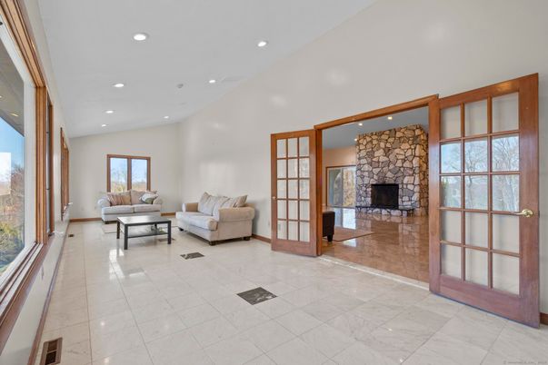 Fireplace, Interior, Living room, Marble, Recessed Lighting, Stone Walls