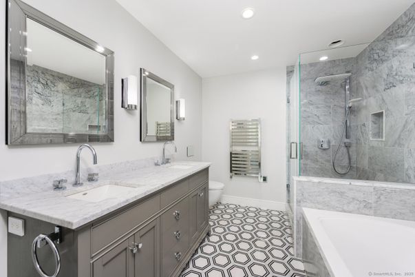Bathroom, Dual Sink Vanities, Glass Shower, Interior, Marble Walls, Recessed Lighting
