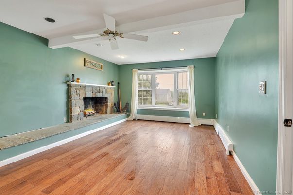Empty room, Fireplace, Interior, Recessed Lighting, Wood Texture Flooring