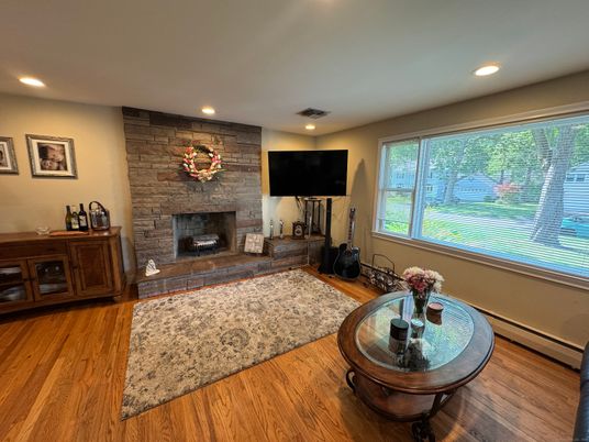 Fireplace, Interior, Recessed Lighting, Stone Walls, Wood Texture Flooring