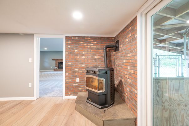 Fireplace, Interior, Recessed Lighting, Stone Walls, Wood Texture Flooring