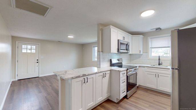 Interior, Kitchen, Recessed Lighting, Stainless Steel Appliances, Wood Texture Flooring