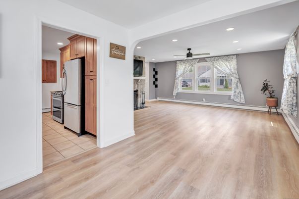 Empty room, Fireplace, Interior, Kitchen, Recessed Lighting, Wood Texture Flooring