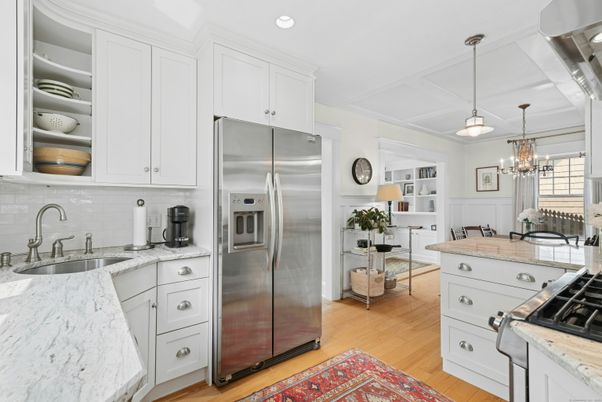 Chandelier, Interior, Kitchen, Pendant Lights, Recessed Lighting, Stainless Steel Appliances, Wood Texture Flooring