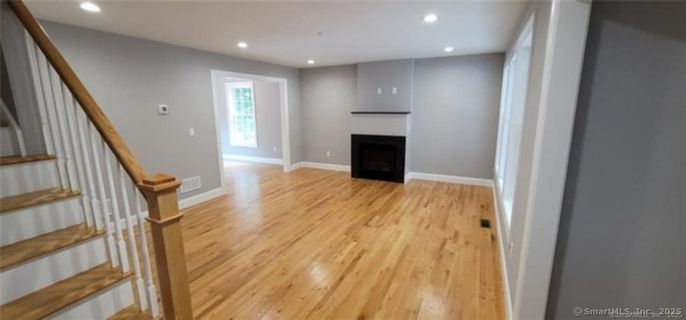 Empty room, Fireplace, Interior, Recessed Lighting, Wood Texture Flooring