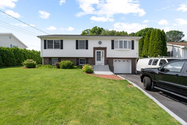 Attached, Exterior, Facade, Brick Facade, Raised Ranch