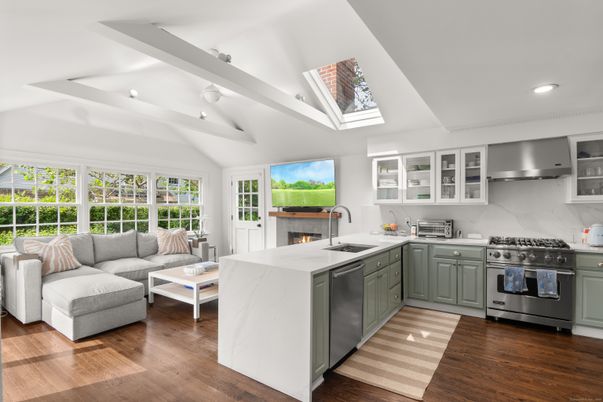 Fireplace, Interior, Kitchen, Living room, Marble Walls, Recessed Lighting, Stainless Steel Appliances, Wood Texture Flooring