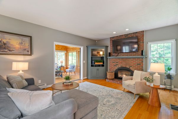 Fireplace, Interior, Living room, Recessed Lighting, Stone Walls, Wood Texture Flooring