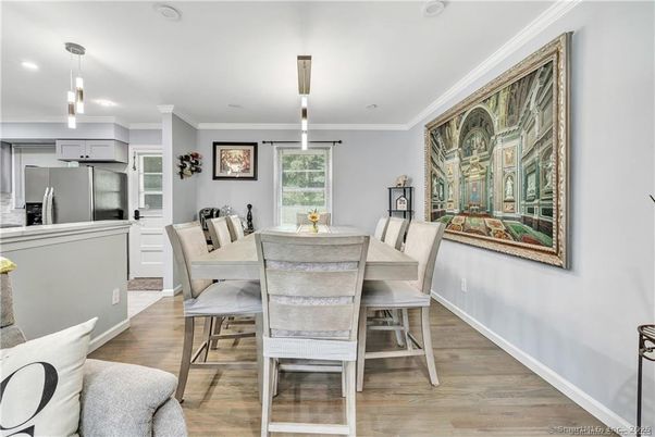 Dining room, Interior, Kitchen, Pendant Lights, Recessed Lighting, Stainless Steel Appliances, Wood Texture Flooring