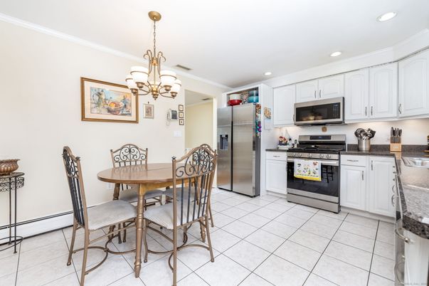 Chandelier, Dining room, Interior, Kitchen, Recessed Lighting, Stainless Steel Appliances