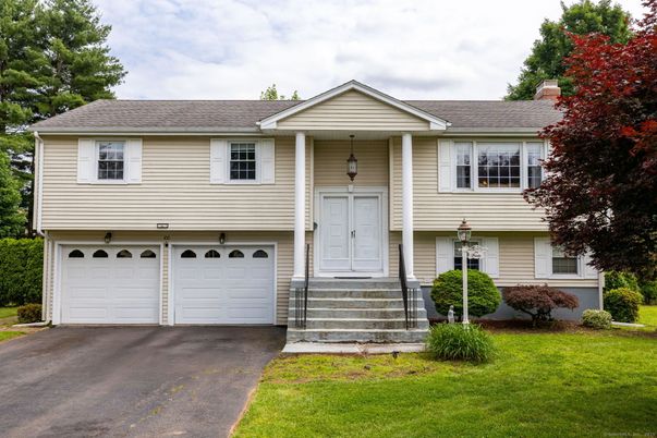 Attached, Exterior, Facade, Raised Ranch
