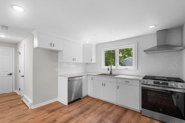 Interior, Kitchen, Recessed Lighting, Stainless Steel Appliances, Wood Texture Flooring