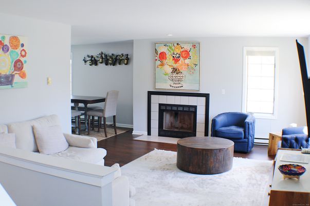 Dining room, Fireplace, Interior, Living room, Recessed Lighting, Wood Texture Flooring