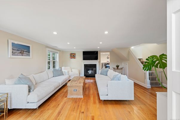 Fireplace, Interior, Living room, Recessed Lighting, Wood Texture Flooring