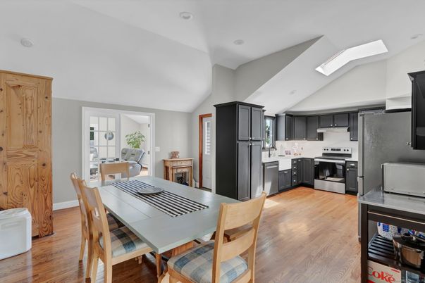 Dining room, Interior, Kitchen, Recessed Lighting, Stainless Steel Appliances, Wood Texture Flooring