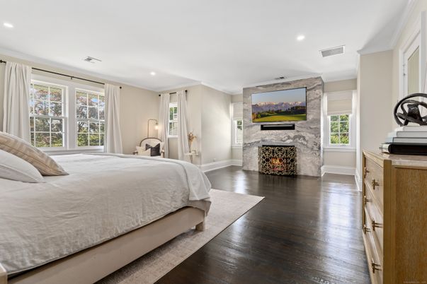 Bedroom, Fireplace, Interior, Recessed Lighting, Wood Texture Flooring