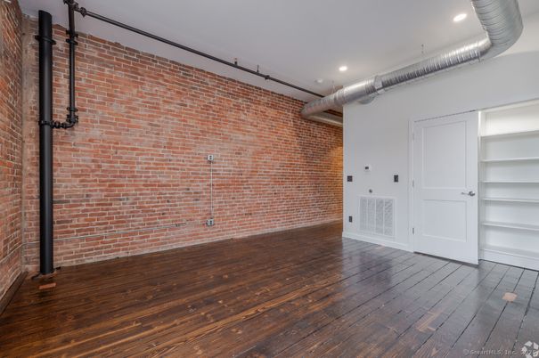 Empty room, Interior, Recessed Lighting, Stone Walls, Wood Texture Flooring