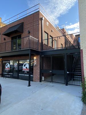 Exterior, Facade, Brick Facade, Condo Building