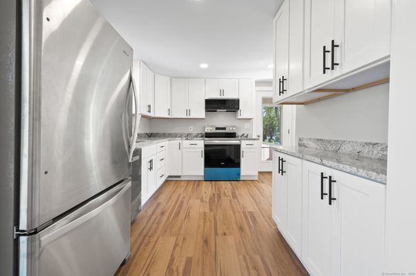 Interior, Kitchen, Recessed Lighting, Stainless Steel Appliances, Wood Texture Flooring