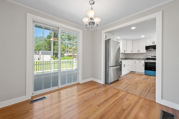Chandelier, Interior, Kitchen, Recessed Lighting, Stainless Steel Appliances, Wood Texture Flooring