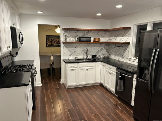 Interior, Kitchen, Marble Walls, Recessed Lighting, Wood Texture Flooring