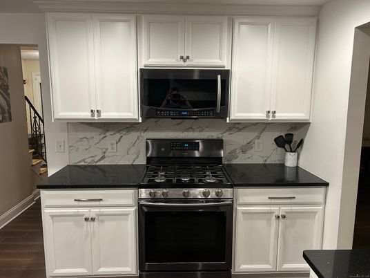 Interior, Kitchen, Marble Walls, Stainless Steel Appliances, Wood Texture Flooring