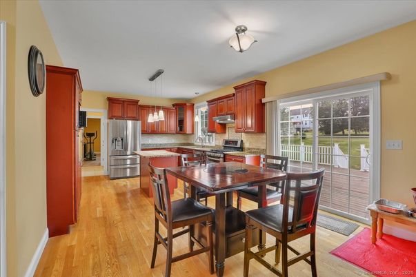 Dining room, Interior, Kitchen, Pendant Lights, Stainless Steel Appliances, Wood Texture Flooring