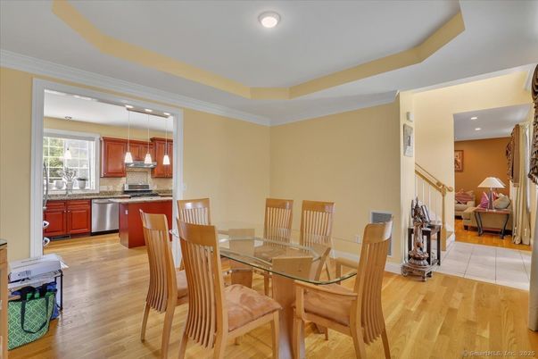 Dining room, Interior, Kitchen, Pendant Lights, Recessed Lighting, Stainless Steel Appliances, Wood Texture Flooring